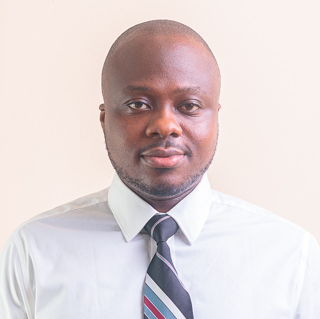 Dr. Charles Roland Haruna